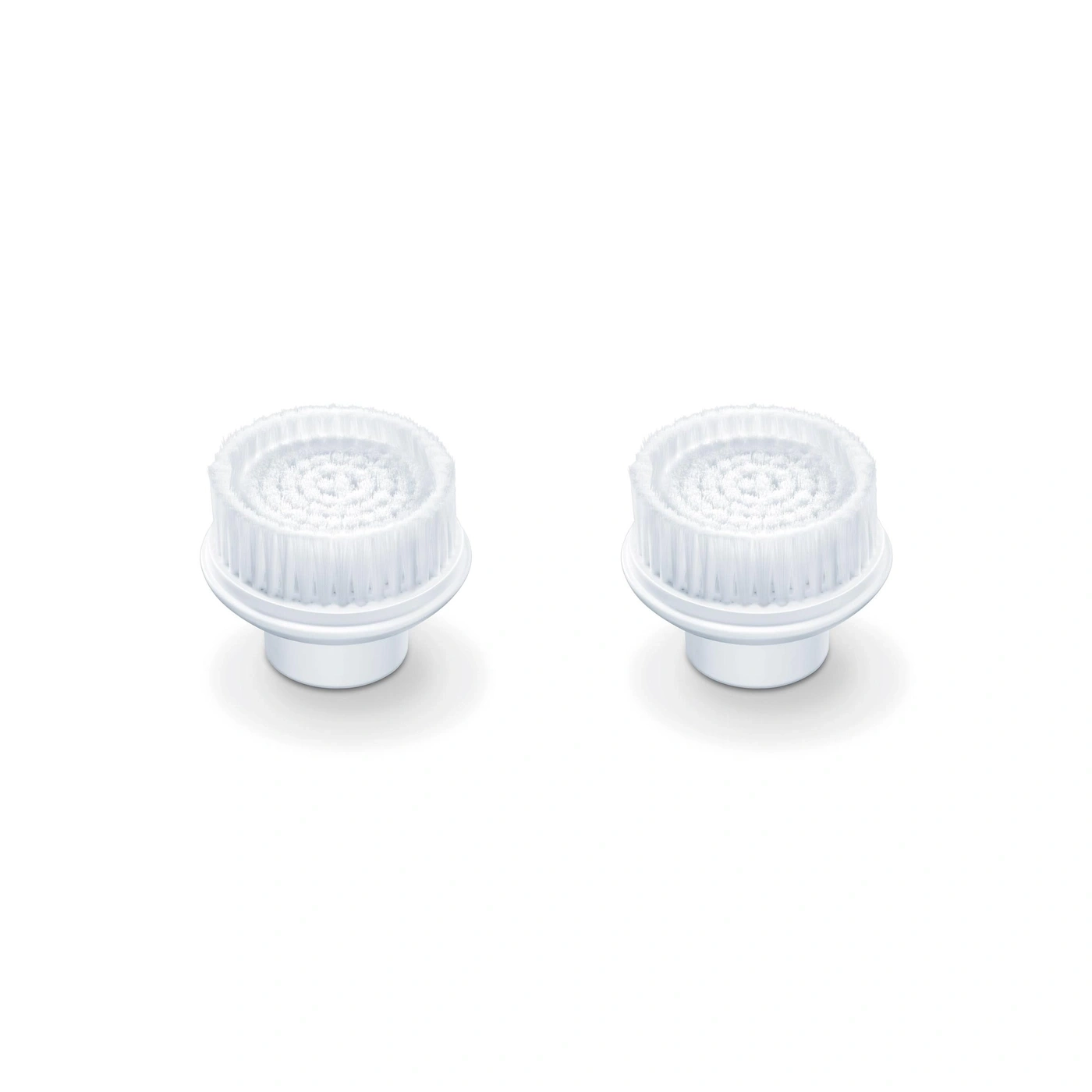 Two white brush heads for facial cleansing
